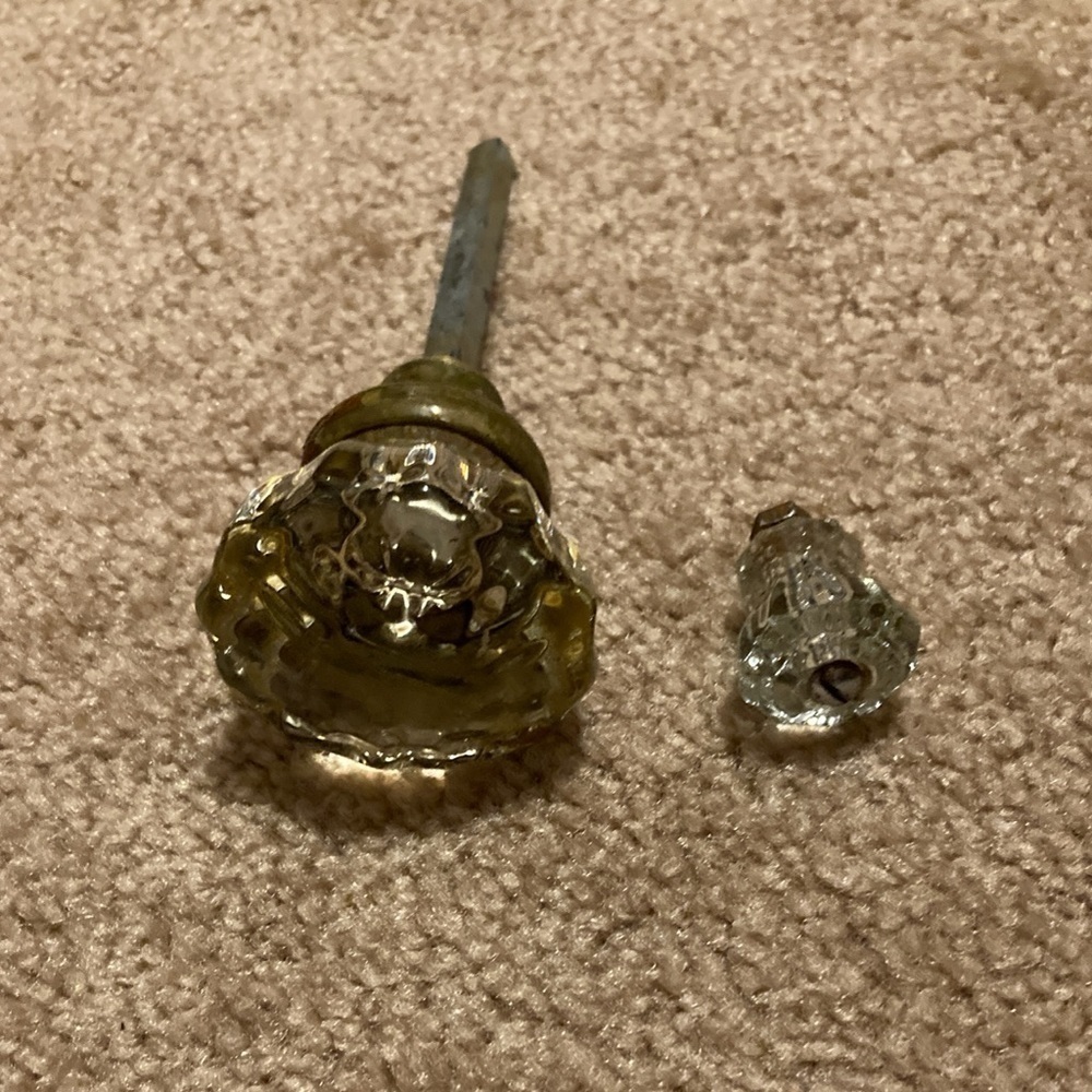 Pair of antique (1920's) clear glass door knob set, scalloped edge